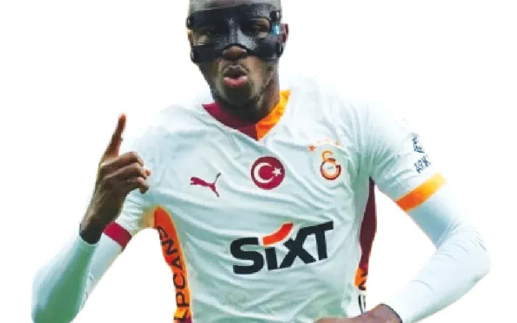 Player celebrating goal wearing mask and jersey Player celebrating goal wearing mask and jersey