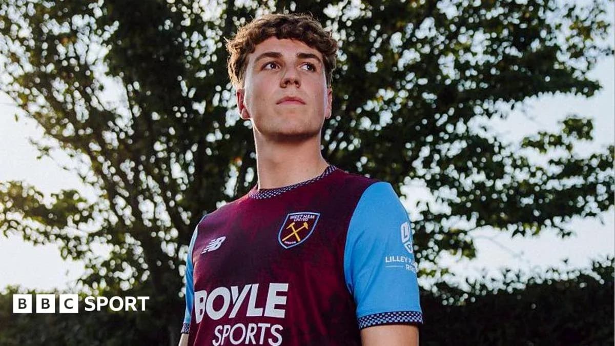 Player wearing West Ham kit outdoors Player wearing West Ham kit outdoors
