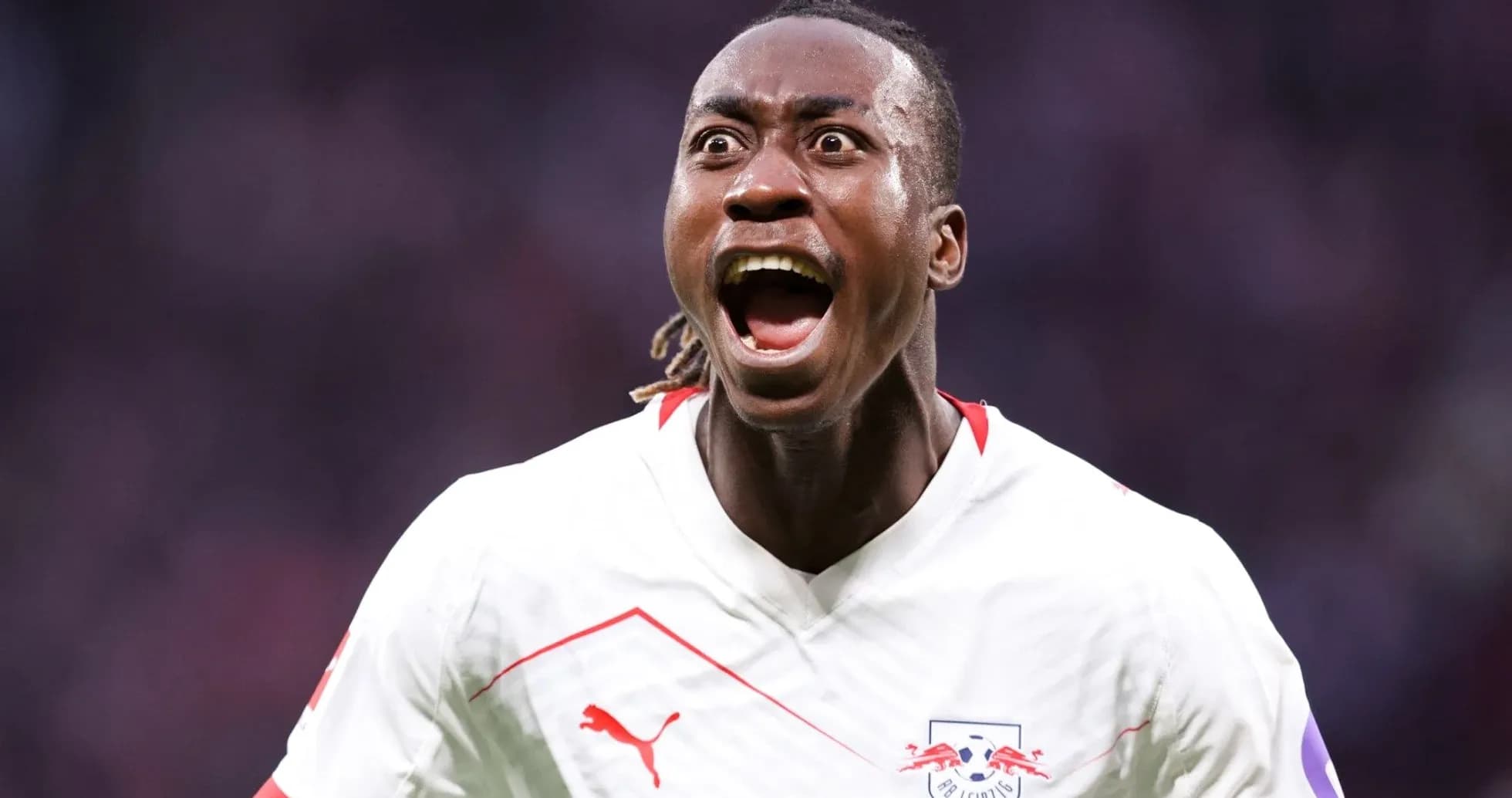 Player celebrating a goal in RB Leipzig jersey Player celebrating a goal in RB Leipzig jersey
