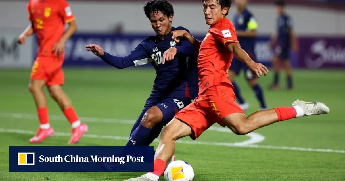 Players challenging for the ball during a match Players challenging for the ball during a match