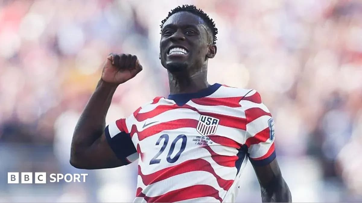 Player celebrating during a soccer match Player celebrating during a soccer match